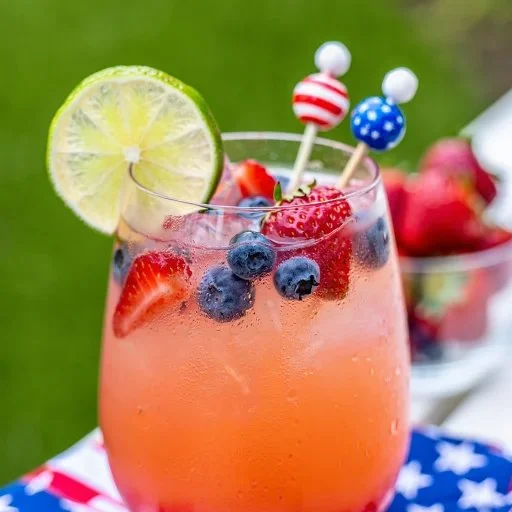 Fresh and vibrant berry cocktail with assorted berries and ice