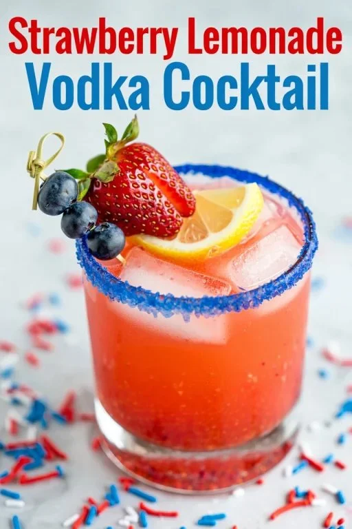 Strawberry Lemonade Vodka Cocktail in a glass garnished with fresh strawberries