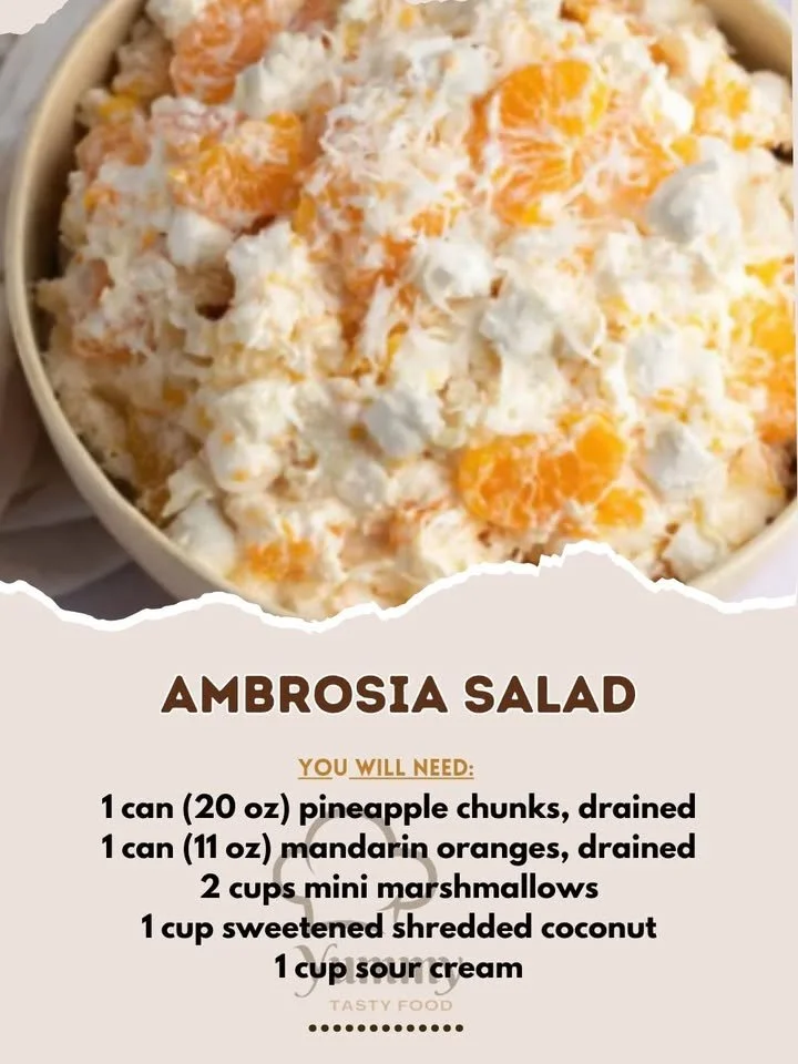 A colorful bowl of Ambrosia Salad with fruits and marshmallows