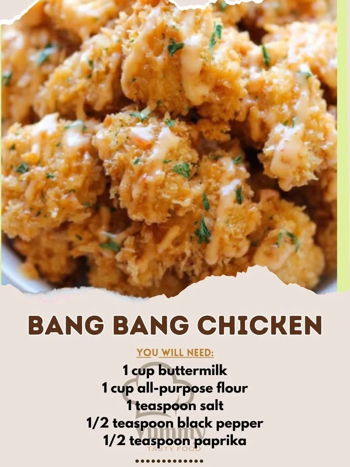 Delicious Bang Bang Chicken served in a bowl with fresh vegetables.
