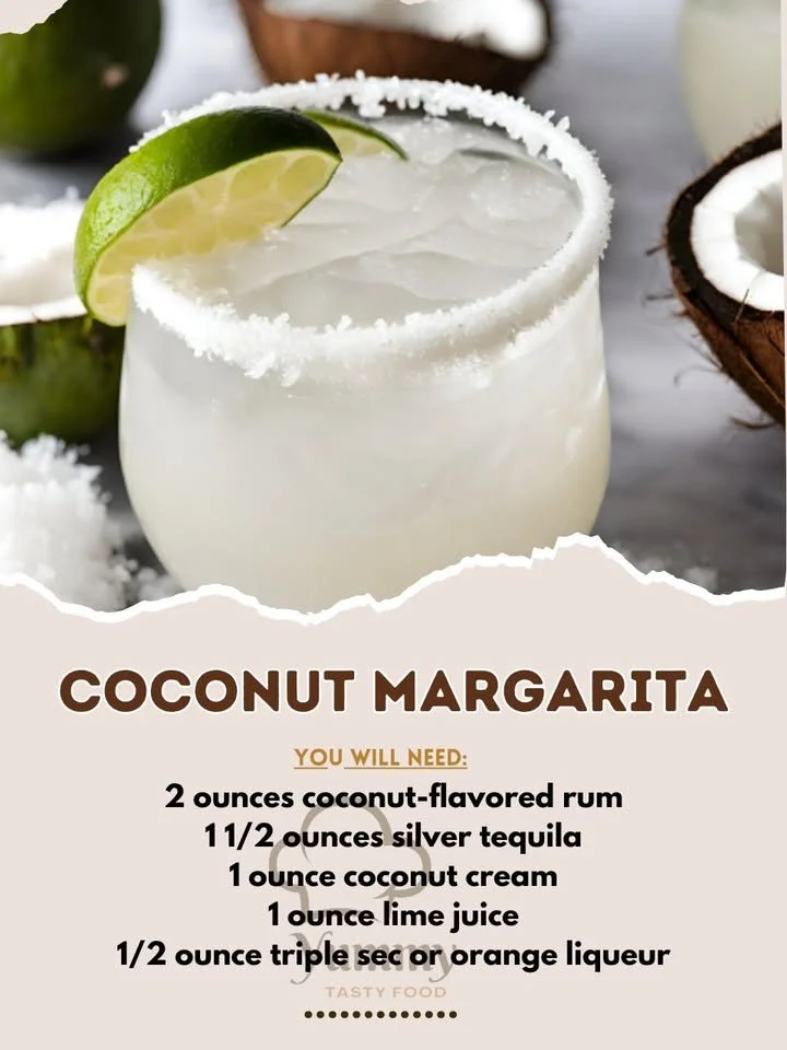 Delicious Coconut Margarita cocktail garnished with lime and coconut flakes.