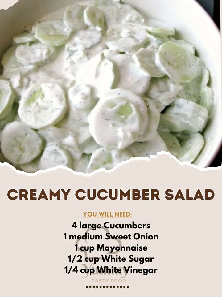 Creamy cucumber salad with fresh ingredients in a bowl