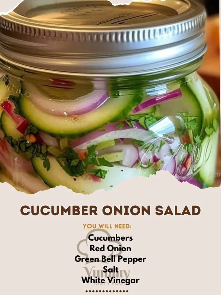 Fresh Cucumber Onion Salad in a bowl with a sprig of parsley