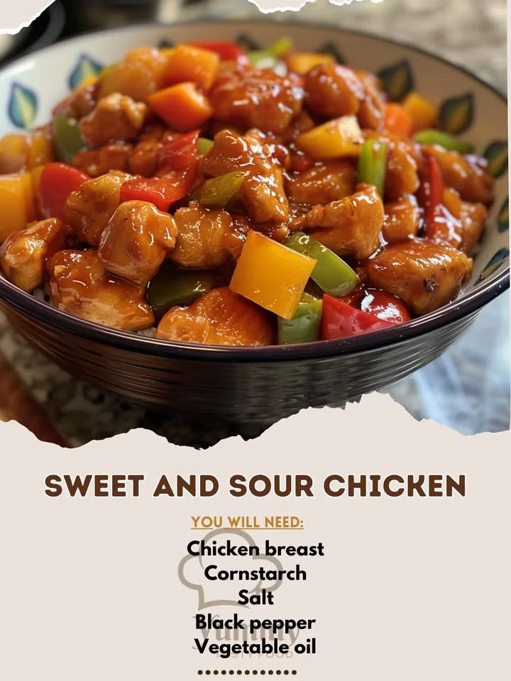 Delicious sweet and sour chicken dish served with colorful vegetables.