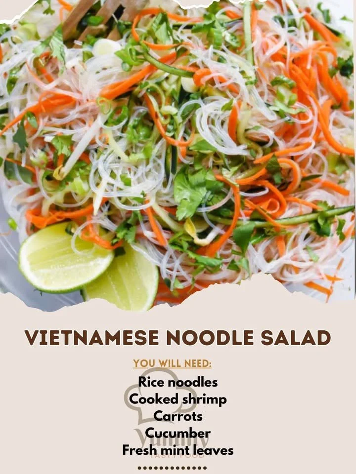 Colorful Vietnamese noodle salad garnished with fresh herbs and vegetables